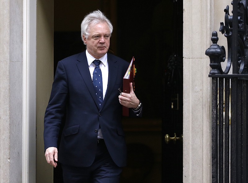 David Davis, Britain's Secretary of State for Exiting the European Union, leaves after a cabinet meeting Wednesday March 29, 2017, in 10 Downing Street, London. Britain will begin divorce proceedings from the European Union later on March 29, starting the clock on two years of intense political and economic negotiations that will fundamentally change both the nation and its European neighbors.
