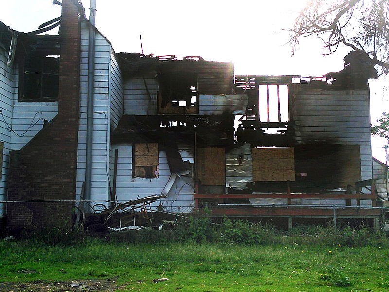 This 2014 photo provided by Jaclyn Bentley' shows the burned remains of her home in Clinton, Iowa. Bentley was acquitted in February 2017 of arson and insurance fraud charges, which she said stemmed from a flawed analysis of cellphone tower records. 