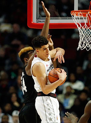 Michael Porter Jr., pulls down a rebound during Wednesday night's McDonald's All- American game in Chicago.