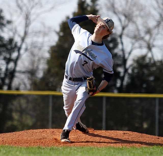 Helias pitcher Tyler Cassmeyer delivers a pitch to the plate during the game Saturday, April 1, 2017 against Fatima at the American Legion Post 5 Sports Complex in Jefferson City.