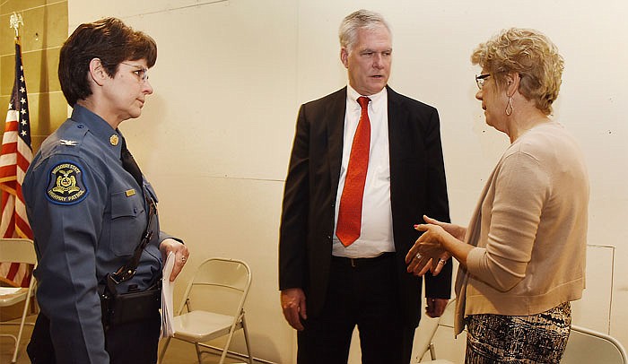 Col. Sandra Karsten, left, and Mark Richardson visit with victim speaker, Jane Fulhage, after the conclusion of Monday's Crime Victims' Rights Week Observance and Ceremony in the Capitol Rotunda. Karsten, who is superintendent of the Missouri State Highway Patrol delivered a speech in which she told of running into a person she had arrested many years earlier for DWI and he thanked her and told her that night was the last time he drank and that she probably saved his life. Richardson is president-elect of the Missouri Association of Prosecuting Attorneys and addressed those in attendance. 
