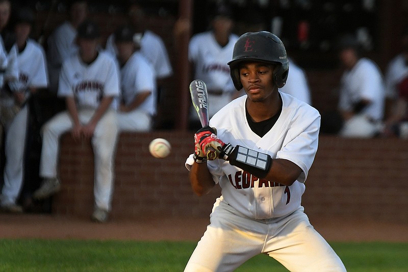 Liberty-Eylau's Darian Walker eyes a pitch that is high of the strike zone Tuesday during their game against Paris at Leopard Field at H.E. Markham Park in Texarkana, Texas.