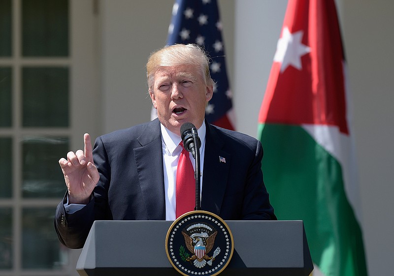 President Donald Trump talks about the attack in Syria during a news conference with Jordan's King Abdullah II, Wednesday, April 5, 2017, in the Rose Garden of the White House in Washington. 