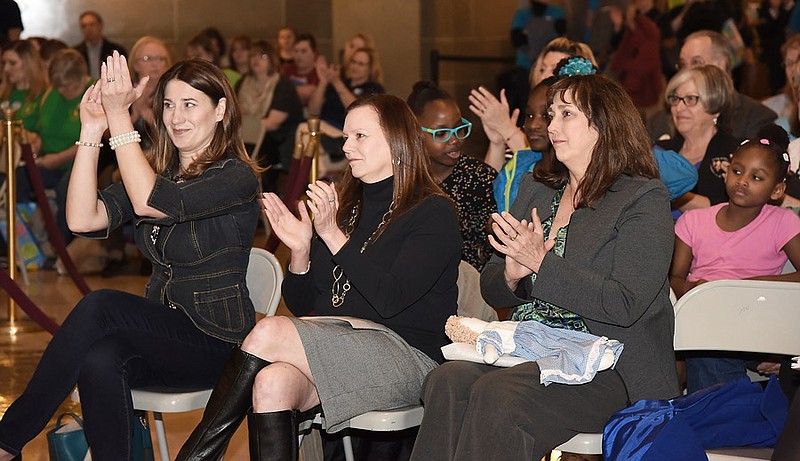 Thursday, April 6, 2017 was Child Advocacy Day in the Missouri Capitol during which representatives of children's agencies and services addressed the crowd. In addition, three Advocate in the Trenches awards were presented, including one to Jefferson CIty Day Care Executive Director, Donna Scheidt, seated foreground right. Seated at left is Kelley Schultz, who works for th Missouri Office of Child Advocate and also received the Advocate in the Trenches award. In the middle is Cindy Reese who works for the state Department of Health and Human Services and received the Lifetime Achievement Award.