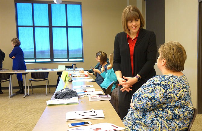 Joy Shawley, member of the American Cancer Society and Fulton resident, visited with state representatives Wednesday. She shared the ACS's work during a Callaway Resource Network meeting.