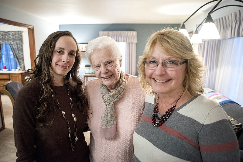 Three generations cherish same wedding dress
