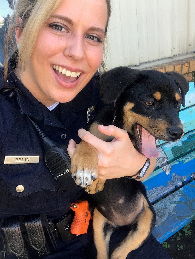 Texarkana, Texas, Police Officer Amber Belin poses with Roxanne on April 3 at Texarkana Animal Care and Adoption Center.