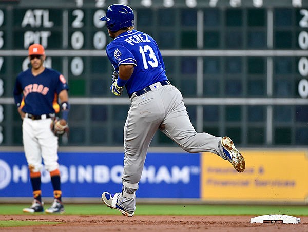 Royals catcher Salvador Perez rounds the bases after hitting a solo home run in the second inning of Sunday's game in Houston.