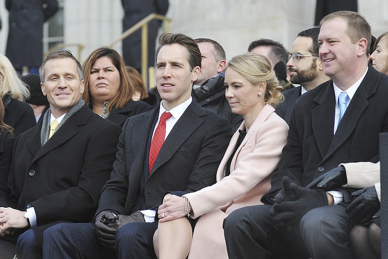 Statewide elected officials are seated during inauguration day ceremonies Jan. 9, 2017. From right, they are Eric Schmitt; Erin Hawley, wife of Attorney General Josh Hawley; and Gov. Eric Greitens.