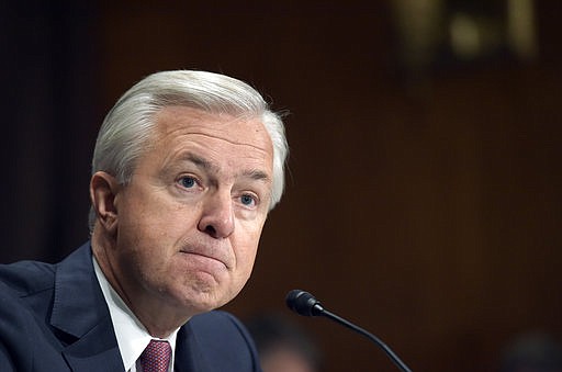 In this Tuesday, Sept. 20, 2016, file photo, Wells Fargo CEO John Stumpf testifies on Capitol Hill in Washington, before the Senate Banking Committee. In the results of an investigation released Monday, April 10, 2017, Wells Fargo's board of directors has blamed the bank's most senior management for creating an "aggressive sales culture" at Wells that eventually led to the bank's scandal over millions of unauthorized accounts. The results of the investigation, conducted by the law firm Shearman & Sterling, also called for millions of dollars in compensation to be clawed back from former CEO Stumpf and community bank executive Carrie Tolstedt.