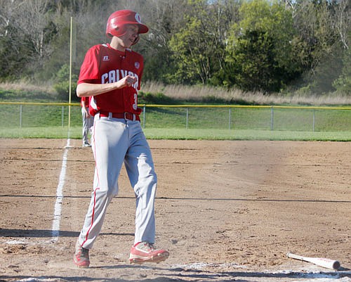 Colin Bernskoetter of Calvary Lutheran trots home to help pad the Lions' lead during Monday's game against Prairie Home at Calvary Lutheran Field.