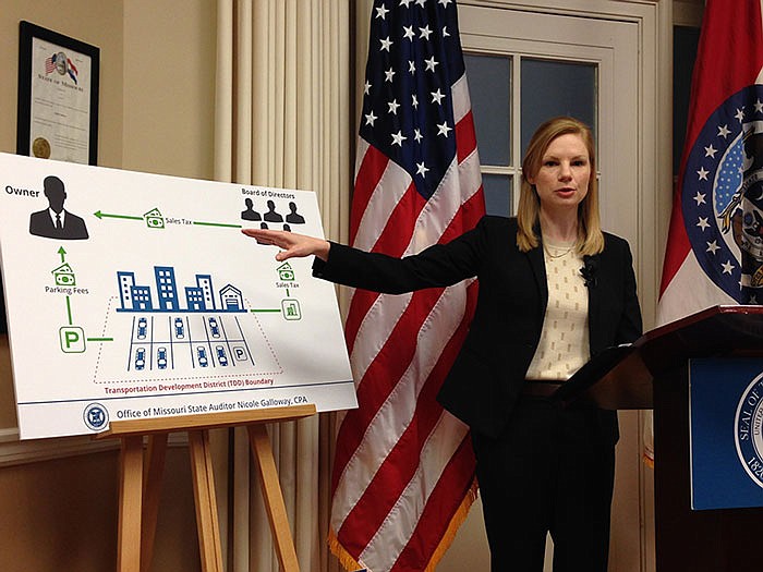 Missouri Auditor Nicole Galloway motions to a chart during a news conference Monday, April 10, 2017.