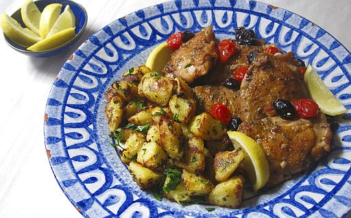 This March 6, 2017 photo shows Greek-style roasted lemon potatoes in New York. This dish is from a recipe by Sara Moulton. (Sara Moulton via AP)