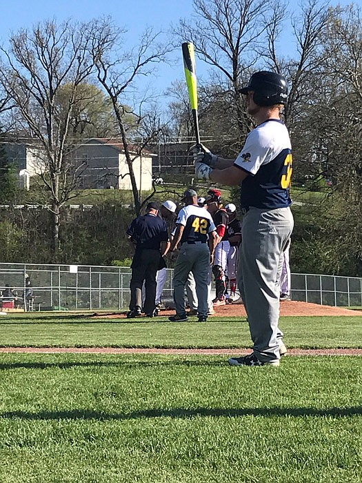 The Jefferson City vs. Moberly game is delayed Tuesday, April 12, 2017 as officials tend to the condition of the pitching mound.