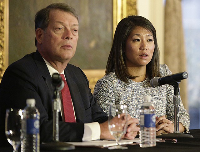 Crystal Pepper, daughter of Dr. David Dao, accompanied by attorney Stephen Golan, speaks Thursday at a news conference in Chicago. Dao, the passenger dragged from a United Express flight Sunday, suffered a "significant" concussion and broken nose, and he lost two front teeth, attorney Thomas Demetrio said Thursday. Dao was removed from the plane after he refused to give up his seat on the full flight from Chicago to Louisville to make room for four crew members.