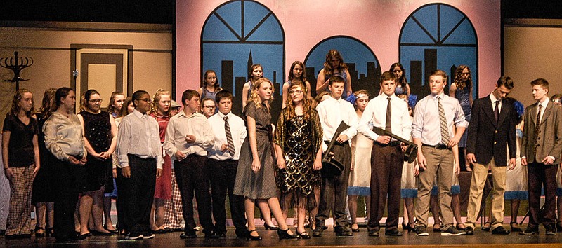The opposing forces finally get together and work it out in the performance of "Bugsy Malone Jr."
