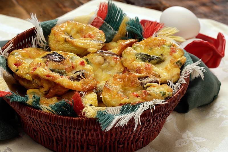 This Jan. 20, 2017, photo shows mushroom and asparagus quiche muffins at the Institute of Culinary Education in New York. These frittatas are quick and easy to prepare and can be filled with any of your favorite cheese, vegetable and/or meat combos. This dish is from a recipe by Elizabeth Karmel. 