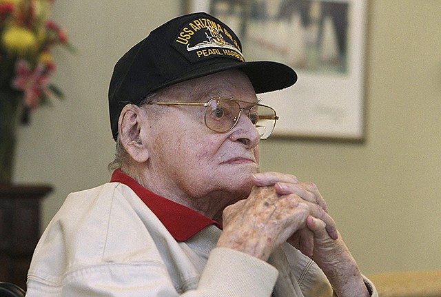 Raymond Haerry sits in West View Nursing & Rehabilitation in April 2016 in West Warwick, Rhode Island. Haerry, one of the last living crew members on the USS Arizona during the Japanese attack on Pearl Harbor, died Sept. 27 in Rhode Island. His remains were interred on the sunken ship Saturday in Pearl Harbor in Honolulu.