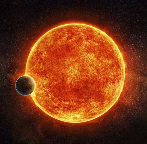 In this artist tendering provided by M. Weiss Harvard-Smithsonian Center for Astrophysics, a newly-discovered rocky exoplanet, LHS 1140b. This planet is located in the liquid water habitable zone surrounding its host star, a small, faint red star named LHS 1140. The planet weighs about 6.6 times the mass of Earth and is shown passing in front of LHS 1140. Depicted in blue is the atmosphere the planet may have retained. (M. Weiss Harvard-Smithsonian Center for Astrophysics via AP)