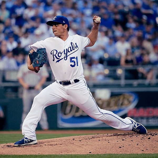 Royals starting pitcher Jason Vargas throws during the first inning of Wednesday night's game against the Giants at Kauffman Stadium in Kansas City.