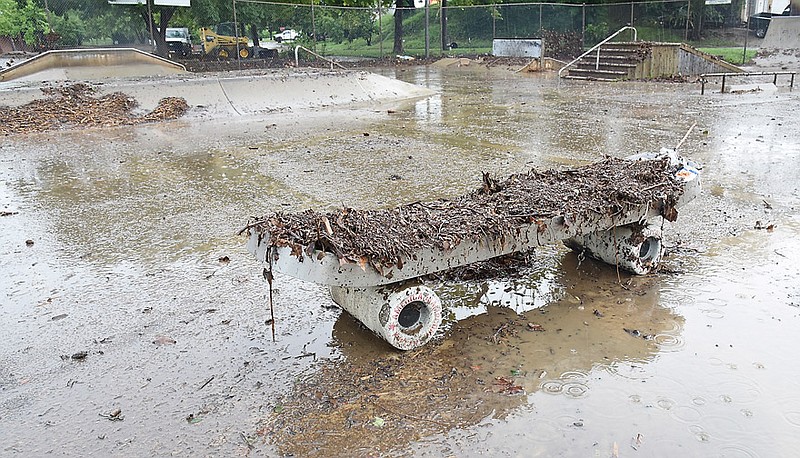 In this Aug. 1, 2016 file photo, mud and debris from flash flooding is seen at the skate park at Washington Park in Jefferson City.