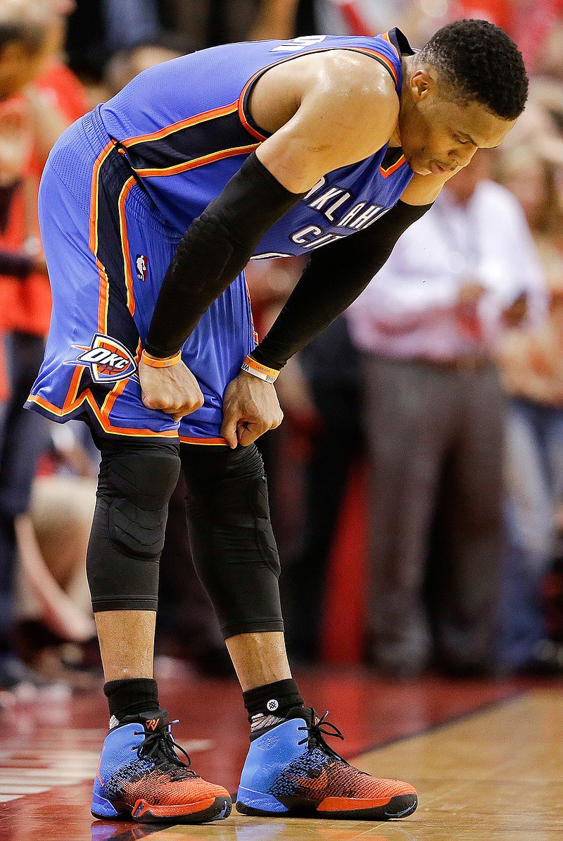 Oklahoma City Thunder guard Russell Westbrook leans over in the waning seconds during the second half in Game 2 of an NBA basketball first-round playoff series, Wednesday, April 19, 2017, in Houston. Houston won 115-111.