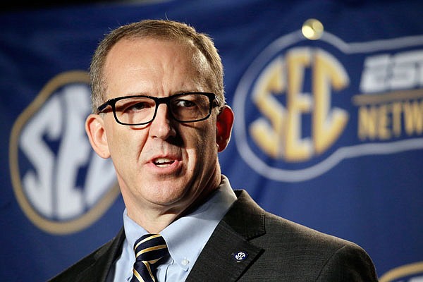 In this March 13, 2015, file photo, Southeastern Conference commissioner Greg Sankey speaks before a college basketball game in Nashville, Tenn.