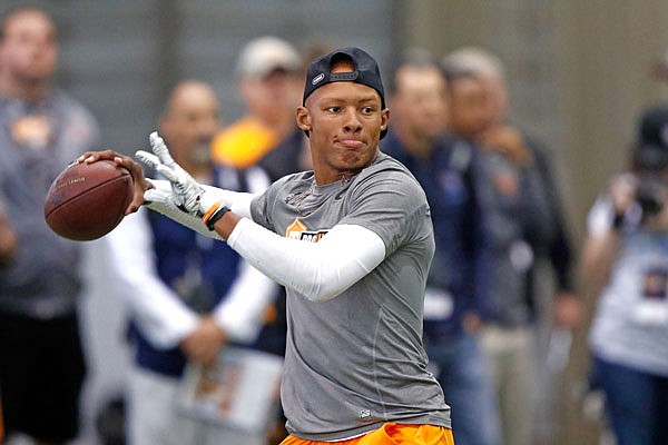 Quarterback Josh Dobbs throws to a receiver during Tennessee's pro day last month in Knoxville, Tenn. Dobbs is projected to be a second-round pick in the NFL draft.