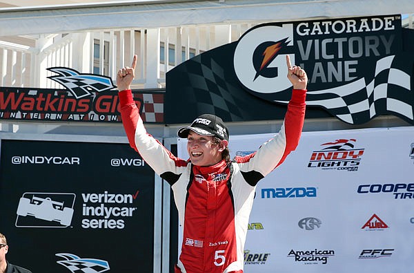 In this Sept. 3, 2016, file photo, Zach Veach celebrates in Victory Lane after winning an Indy Lights race at The Glen in Watkins Glen, N.Y.  Veach will make his IndyCar debut Sunday at Barber Motorsports Park Birmingham, Ala.