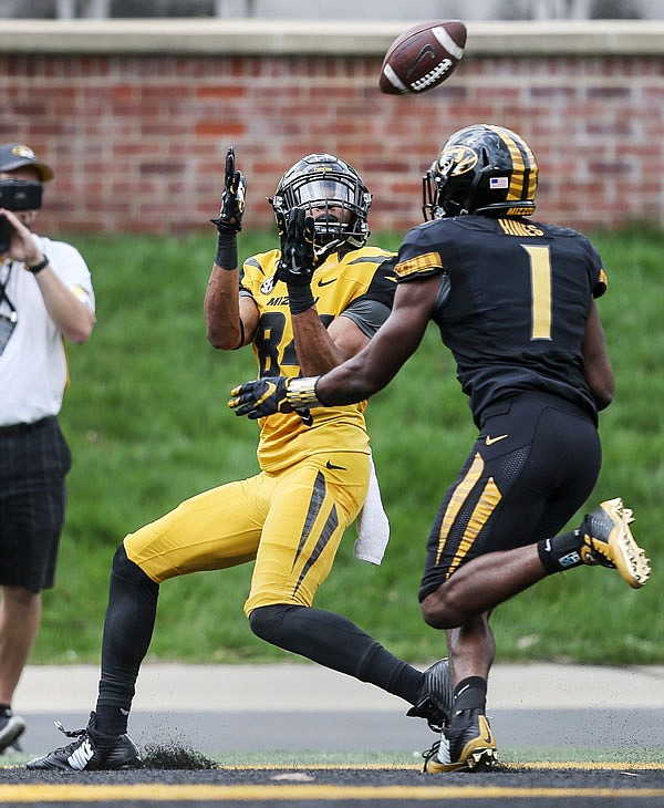 Missouri wide receiver Emanuel Hall (left) receives a pass for a touchdown in front of safety Anthony Hines during the Tigers' Black and Gold spring game last Saturday in Columbia. All 13 Southeastern Conference spring games aired live on TV this year, including Missouri's game, which was broadcast on the SEC Network.