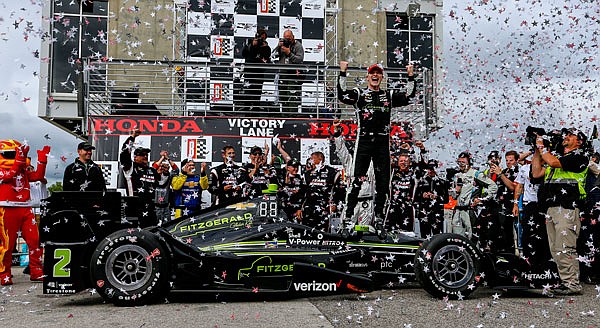 Josef Newgarden celebrates after winning the Indy Grand Prix of Alabama on Sunday in Birmingham, Ala.