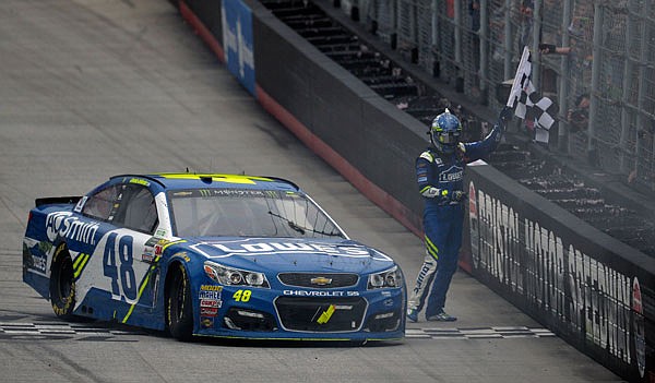 Jimmie Johnson celebrates his win in the Food City 500 on Monday at Bristol Motor Speedway in Bristol, Tenn.