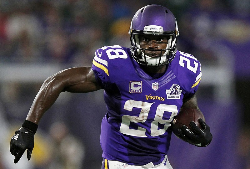 In this Sept. 18, 2016, file photo, Minnesota Vikings running back Adrian Peterson carries the ball during the first half of an NFL football game against the Green Bay Packers, in Minneapolis.  Free-agent running back Adrian Peterson has reportedly agreed to a two-year contract with the New Orleans Saints. The Saints have not announced a deal, but Peterson tells ESPN in a statement that he's agreed to play in New Orleans. 