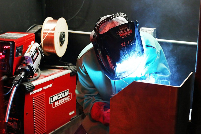 Cole Guerrant, as a second-year welding student, works in April 2017 at the new Welding Technology Center at the State Technical College of Missouri in Linn. The facility's mission is to bring more skilled workers to manufacture goods within the state.
