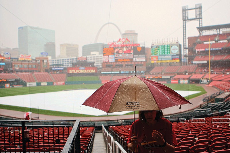 In this June 14, 2015 file photo, rain falls on Busch Stadium, postponing a St. Louis Cardinals game.