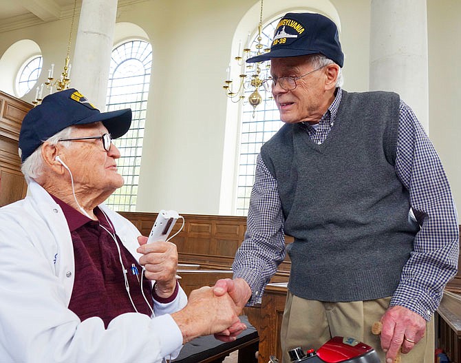 Two gentlemen created history Tuesday morning when they met in the center aisle of the Church of St. Mary the Virgin, Aldermanbury. At 103 years of age, Jim Downing, left, is the second-oldest survivor of Pearl Harbor. Dr. Richard White, of Fulton, age 90, also served during World War II. White said while his ship, the USS Pennsylvania, was at Pearl Harbor, he wasn't at the Dec. 7, 1941, attack. Downing visited the National Churchill Museum while making a trip to Mid-Missouri.