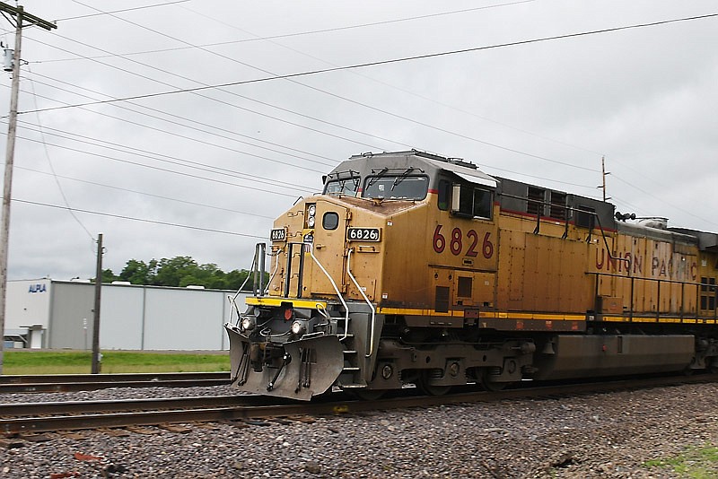 In this June 20, 2016 file photo, a Union Pacific freight train passes through the crossing at Militia Drive in eastern Cole County. 