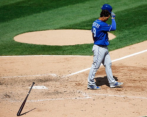 Cheslor Cuthbert of the Royals walks away from the plate after striking out swinging during the sixth inning of Wednesday afternoon's game against the White Sox in Chicago.