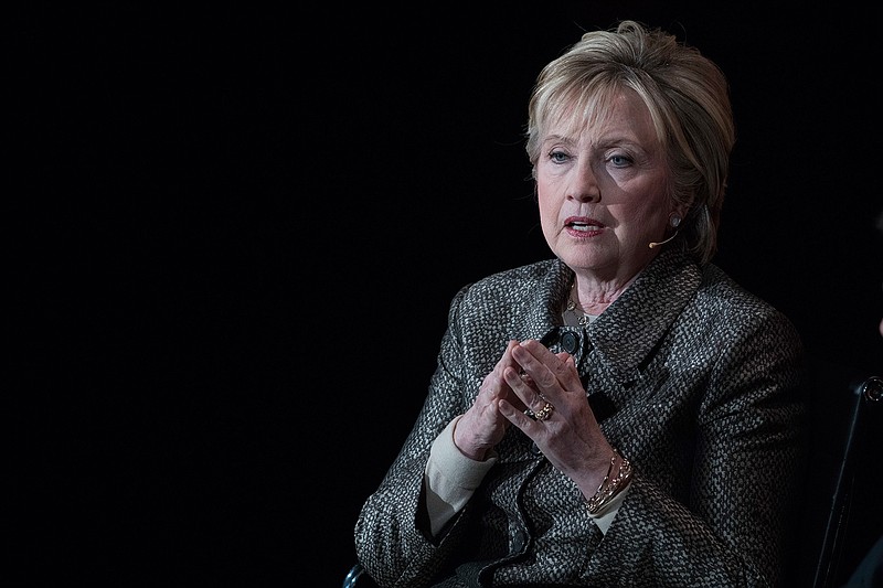 In this photo taken April 6, 2017, former Secretary of State Hillary Clinton speaks in New York. A congressional committee on Thursday, April 27, 2017, asked the Justice Department to consider criminally prosecuting a technology services company that was involved in maintaining a private email server for Hillary Clinton. 