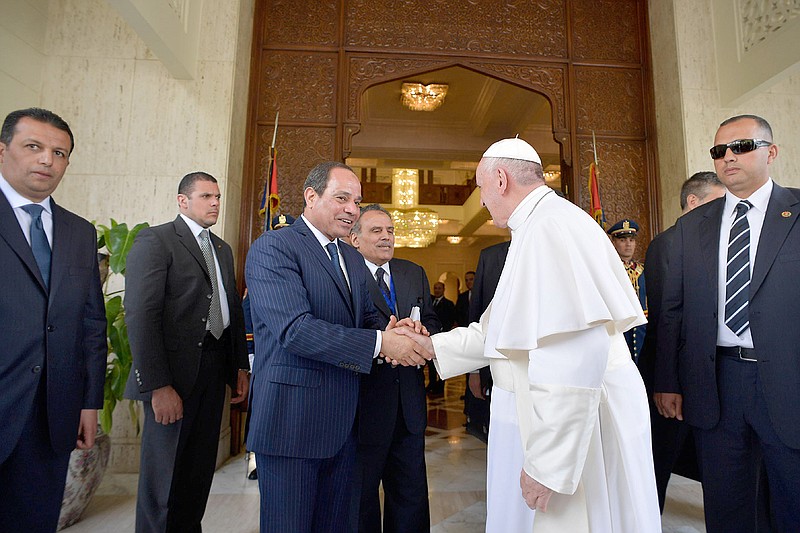 Pope Francis, right, meets Egyptian President Abdel-Fattah El-Sissi on Friday in Cairo. Francis is in Egypt for a two-day trip aimed at presenting a united Christian-Muslim front that repudiates violence committed in God's name.