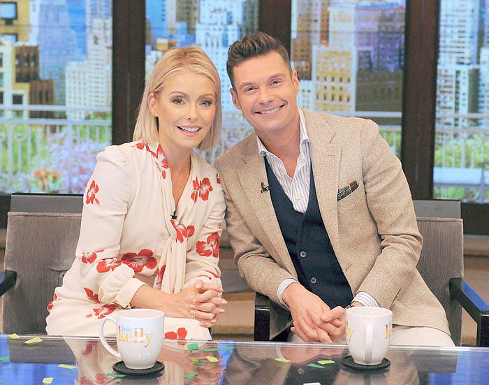 Kelly Ripa and Ryan Seacrest pose for a photo at "Live" on Monday in New York. Seacrest was named co-host of the morning chat show, ending a yearlong search for a marquee name as Michael Strahan's successor.