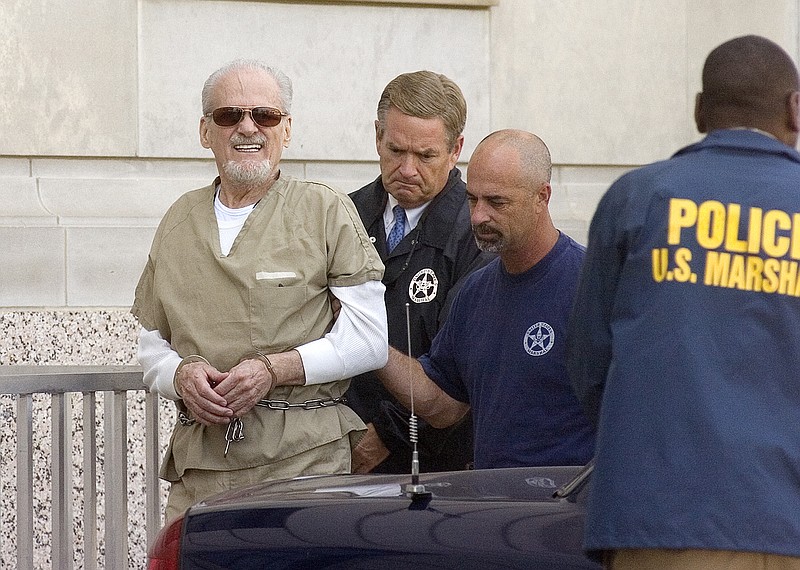 Evangelist Tony Alamo is led from the federal courthouse Monday July 13, 2009, in downtown Texarkana, Ark. He was convicted on 10 counts of bring five young girls across state lines for sex Friday, July 24, 2009, and sentenced to 175 years in prison later that year. Alamo died Tuesday, May 2, 2017, in prison.