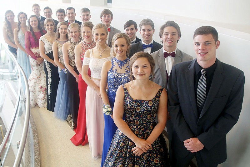 The Helias High School prom court poses April 30, 2017 at St. Mary's Health Center. J. Elliot Hollingsworth, front left, was named princess, and Ethan Rackers, third row, right, was crowned prince.
