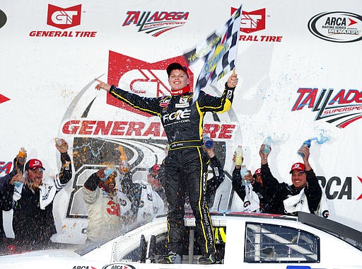 Justin Haley celebrates in Victory Lane after winning the General Tire 200 at Talladega Superspeedway, Saturday, May 6, 2017, in Talladega, Ala. 