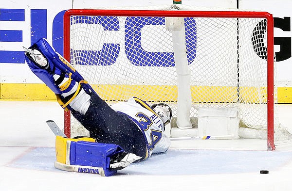 Blues goalie Jake Allen falls to the ice Sunday afternoon after Ryan Johansen of the Predators scored the winning goal during the third period in Game 6 of the Western Conference semifinals in Nashville, Tenn.