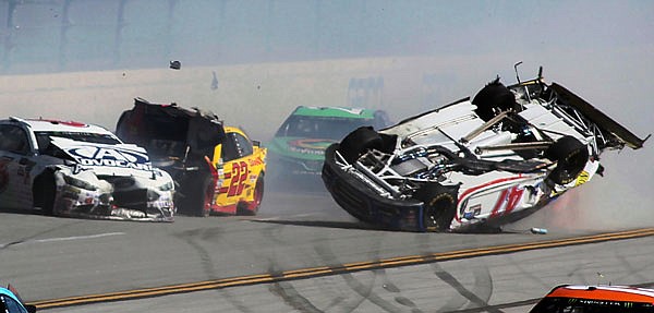 The No. 47 car of AJ Allmendinger flips on the backstretch during a crash involving multiple drivers bringing out a red flag late in Sunday's NASCAR Cup series race at Talladega Superspeedway in Talladega, Ala.