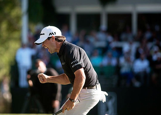 Brian Harman celebrates Sunday after his putt on the 18th hole to win the Wells Fargo Championship in Wilmington, N.C.