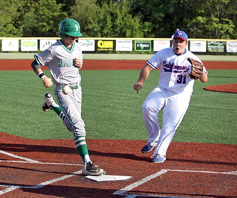 Blair Oaks courtesy runner Jacob Stegemann crosses the plate as California pitcher Gabe Bailey attempts to field a throw from catcher Sam Kirby after a wild pitch during the fifth inning of Monday's game at California.
