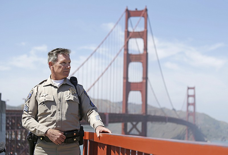 California Highway Patrol Sgt. Kevin Briggs poses by the Golden Gate Bridge on April 2013 in San Francisco. When someone puts one leg over the railing of the Golden Gate Bridge and contemplates plunging into the San Francisco Bay, police officers can often persuade them to come back from the ledge. "What happens with these kids is they are so impulsive that they don't see into their future, they don't see a way out," Briggs said. Facebook said it was implementing new methods of reaching out to people in real time when they go threaten to take their own lives.