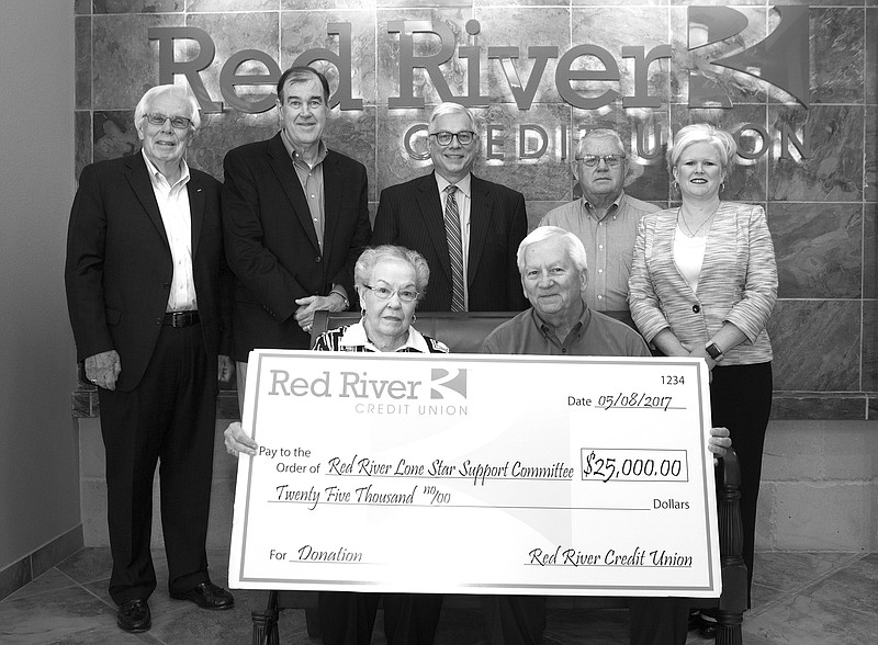 Red River Credit Union recently donated $25,000 to the Red River Lone Star Support Committee to help support the committee's work to keep area military installations off the U.S. government's Base Realignment and Closures list. Pictured front row Sammie Murdock, Robert Buck back row Fred Minton, Steve Connor, Jerry Sparks, Even Williamson and Patricia Cunningham.
